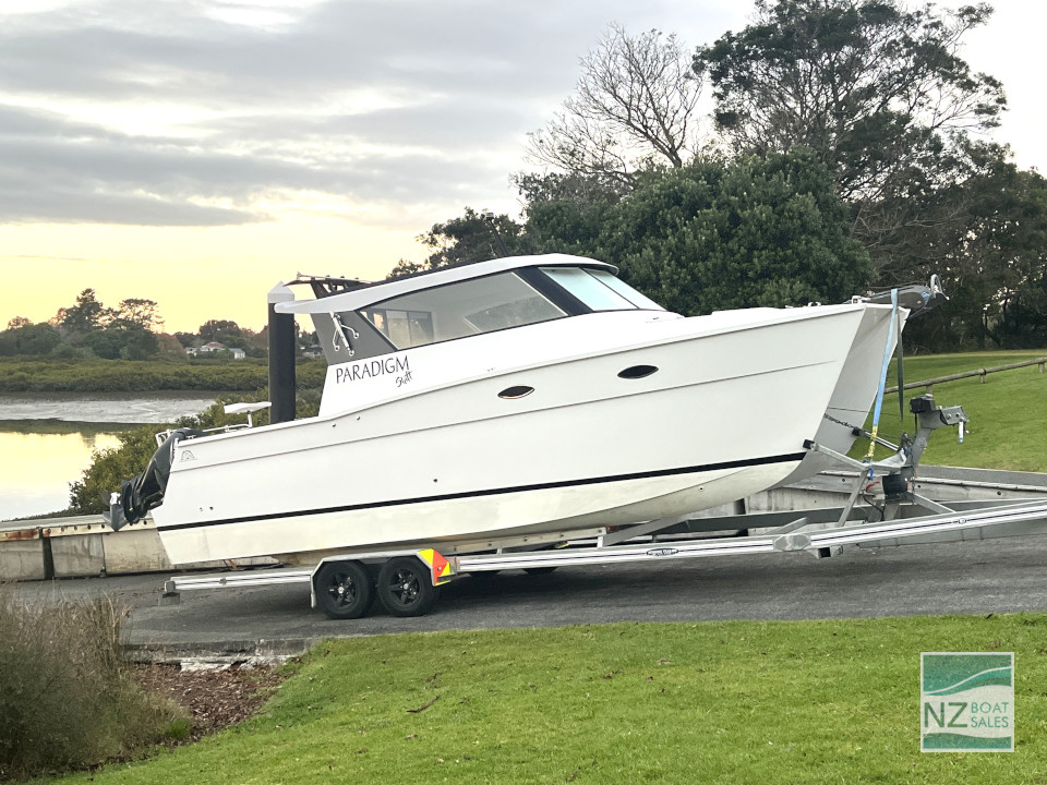 Paradigm Shift – Dan Leech Custom Power Cat – Near-New on Trailer