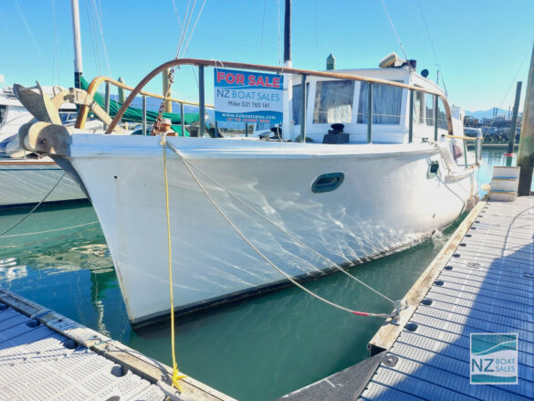 Leeway 42ft kauri launch moored at Motueka Marina
